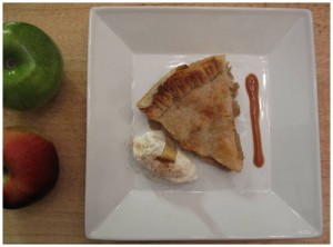 apple pie with ice cream and caramel sauce